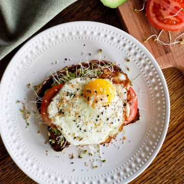 avocado toast with egg on plate