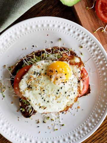 avocado toast with egg on plate