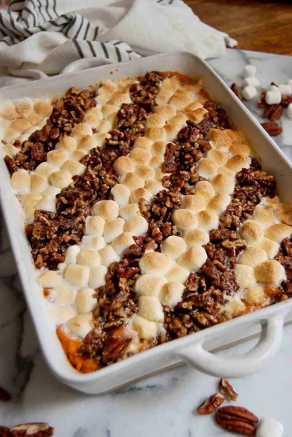 side view of old school sweet potato casserole with marshmallows.