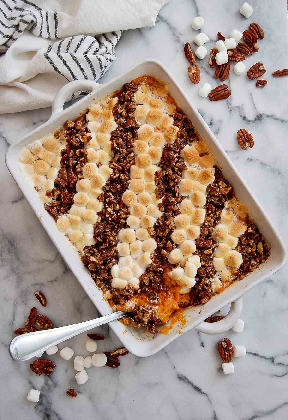 old fashioned sweet potato casserole with marshmallows and pecan topping.