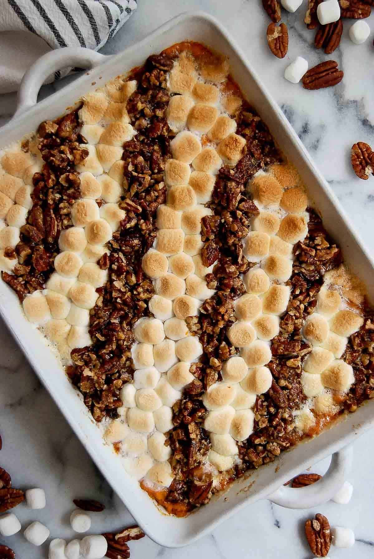 grandma's sweet potato casserole with marshmallows and pecan topping.