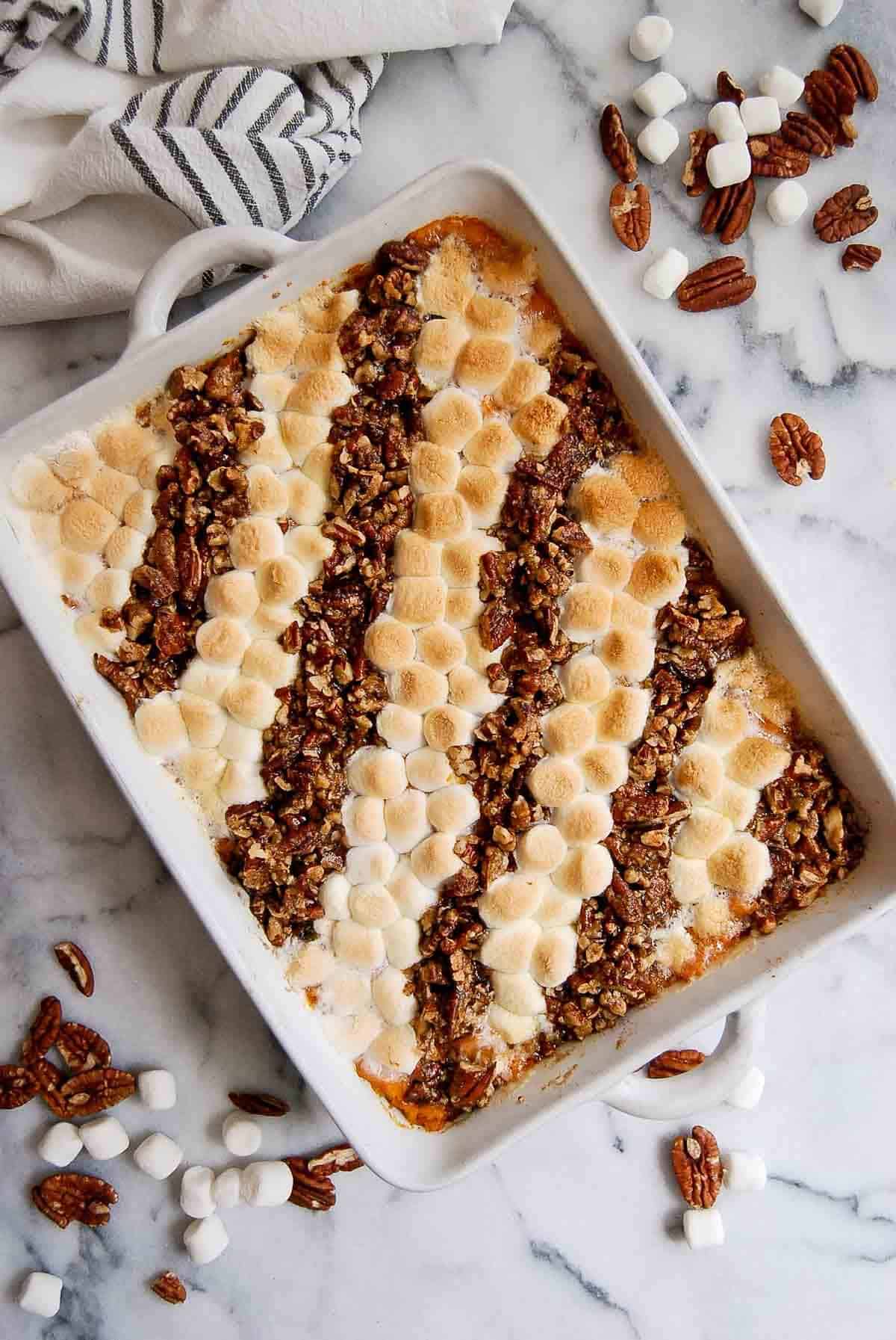 old fashioned sweet potato casserole with toasted marshmallows and pecan topping.