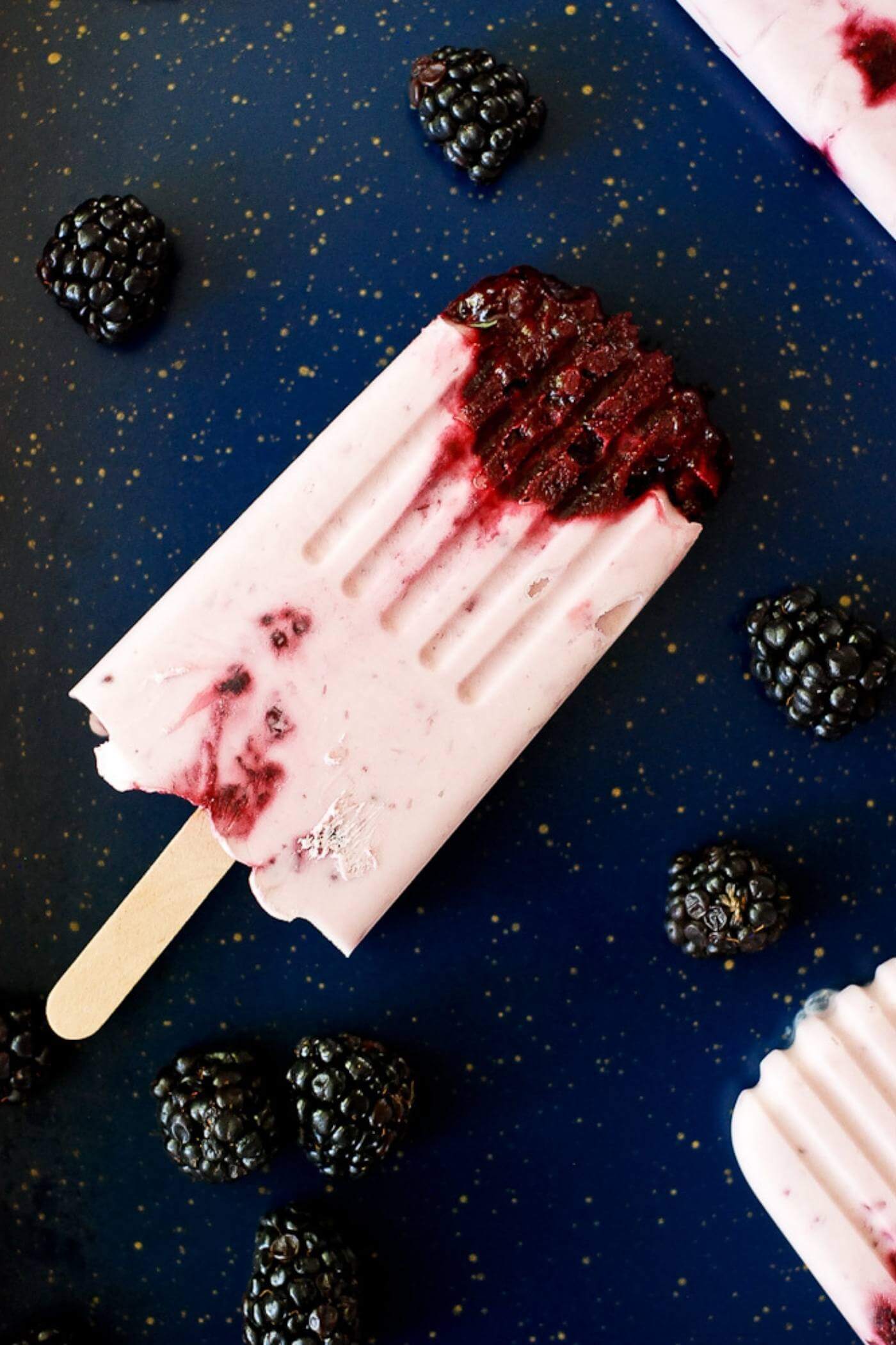 Blackberry Creamsicle on tray with blueberries.