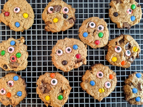 Halloween Candy Monster Cookies On Cooling Rack.