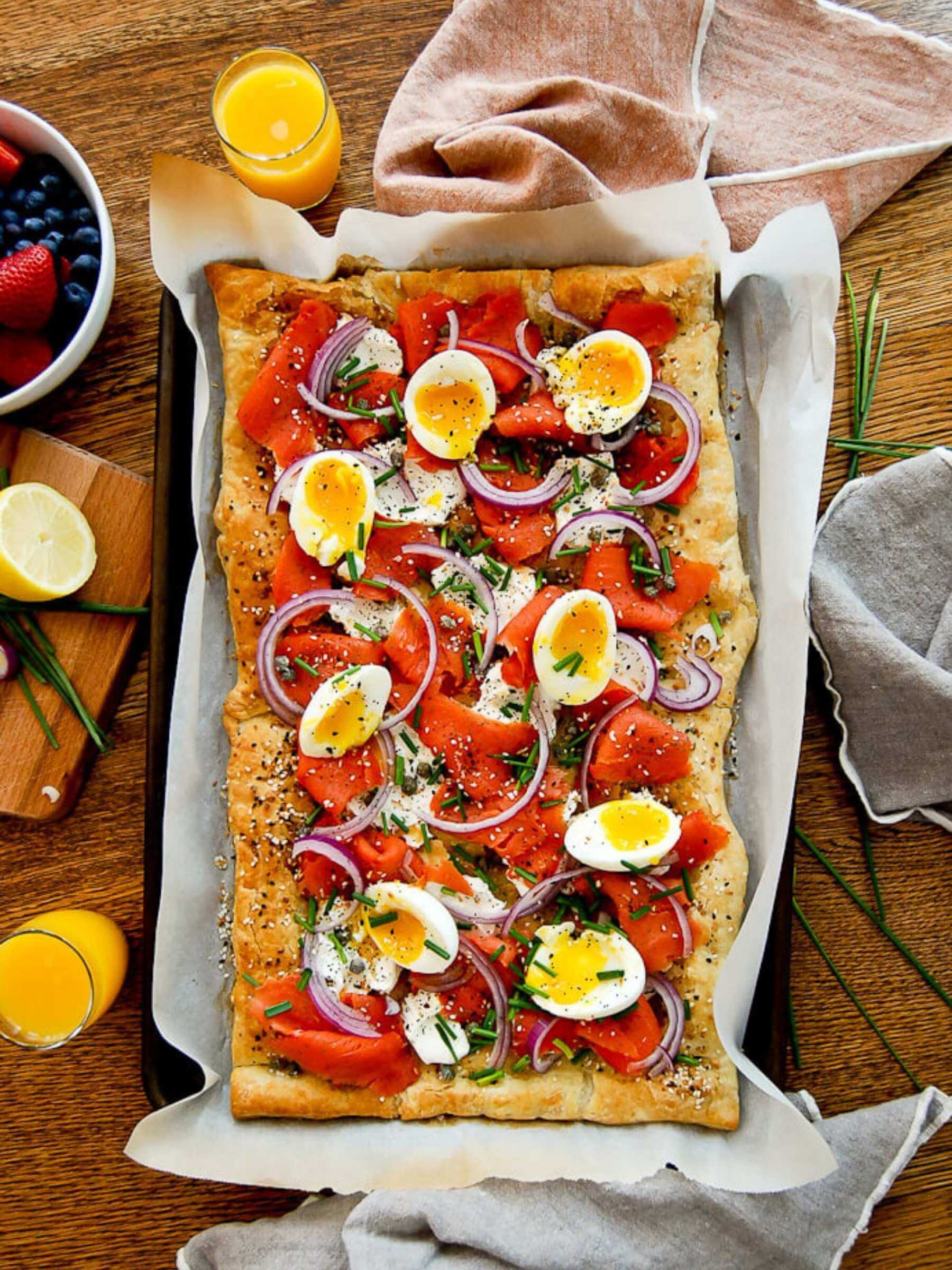 Full smoked salmon pizza on sheet pan.