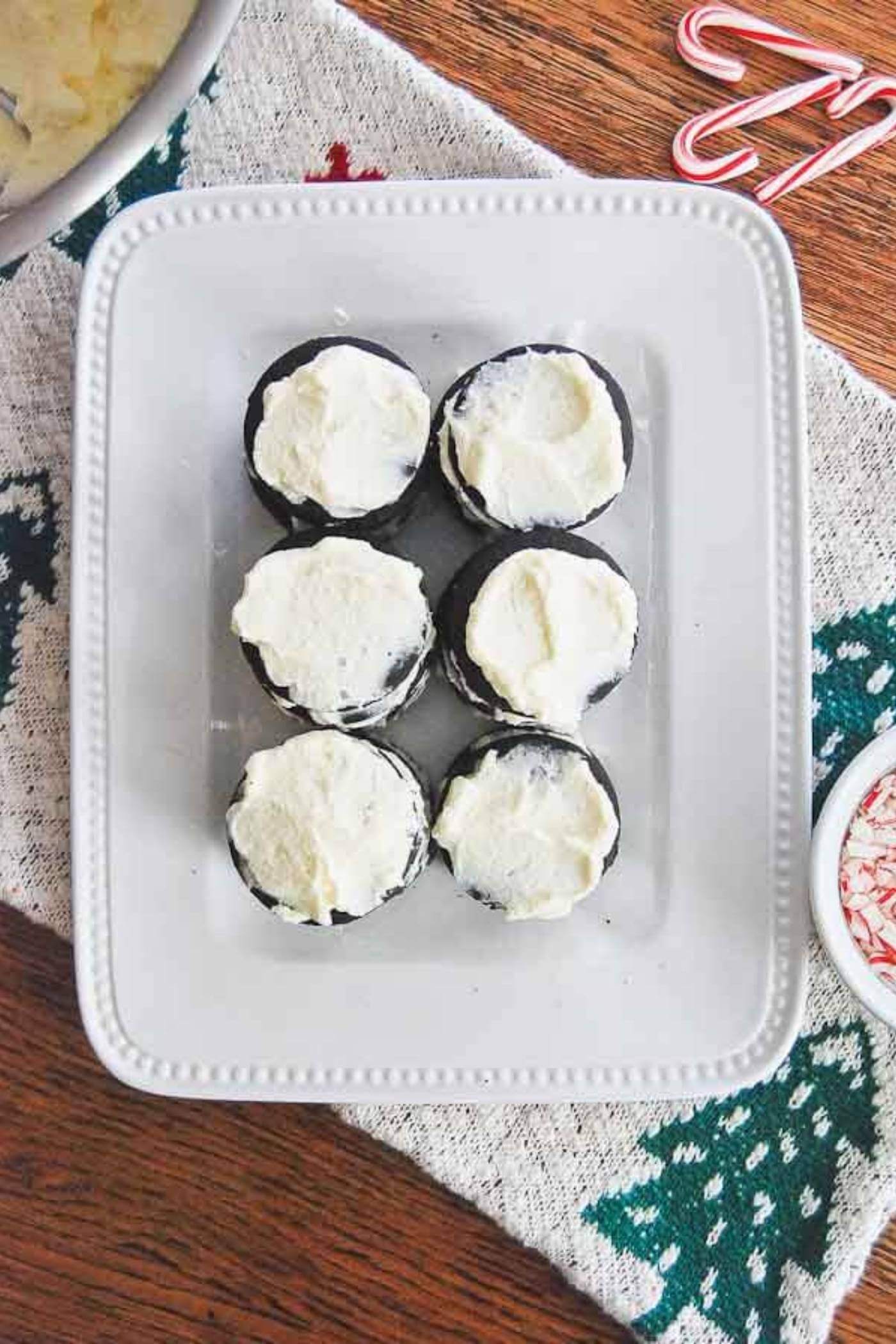 Chocolate Wafers and Peppermint whipped cream cake assembly.