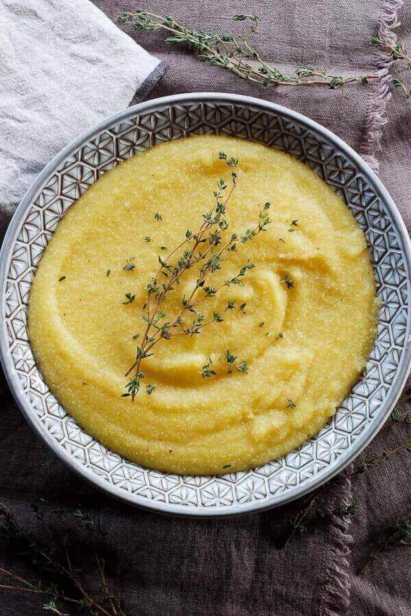 polenta in bowl with rosemary