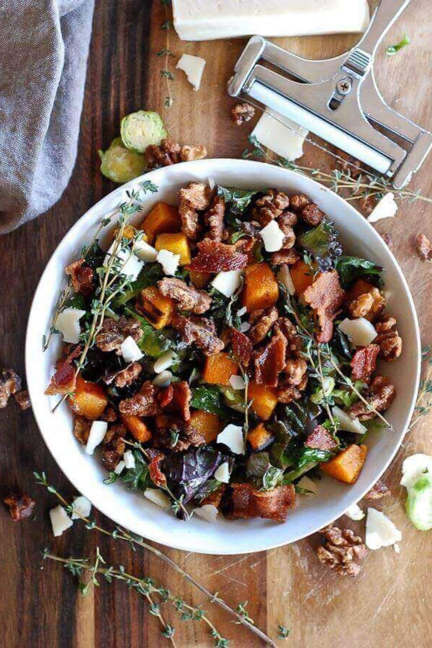 kale salad with brussels sprouts, roasted butternut squash, and maple walnuts.