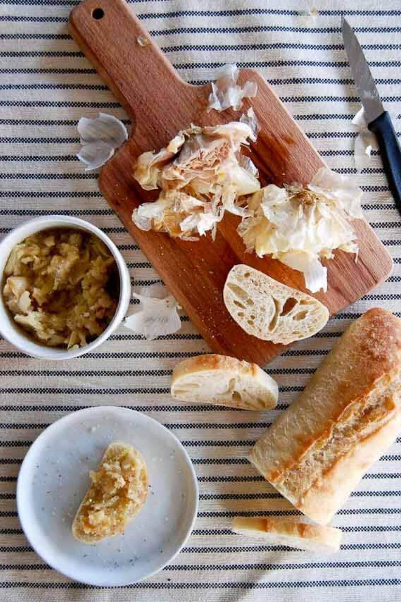 roasted garlic in bowl with bread