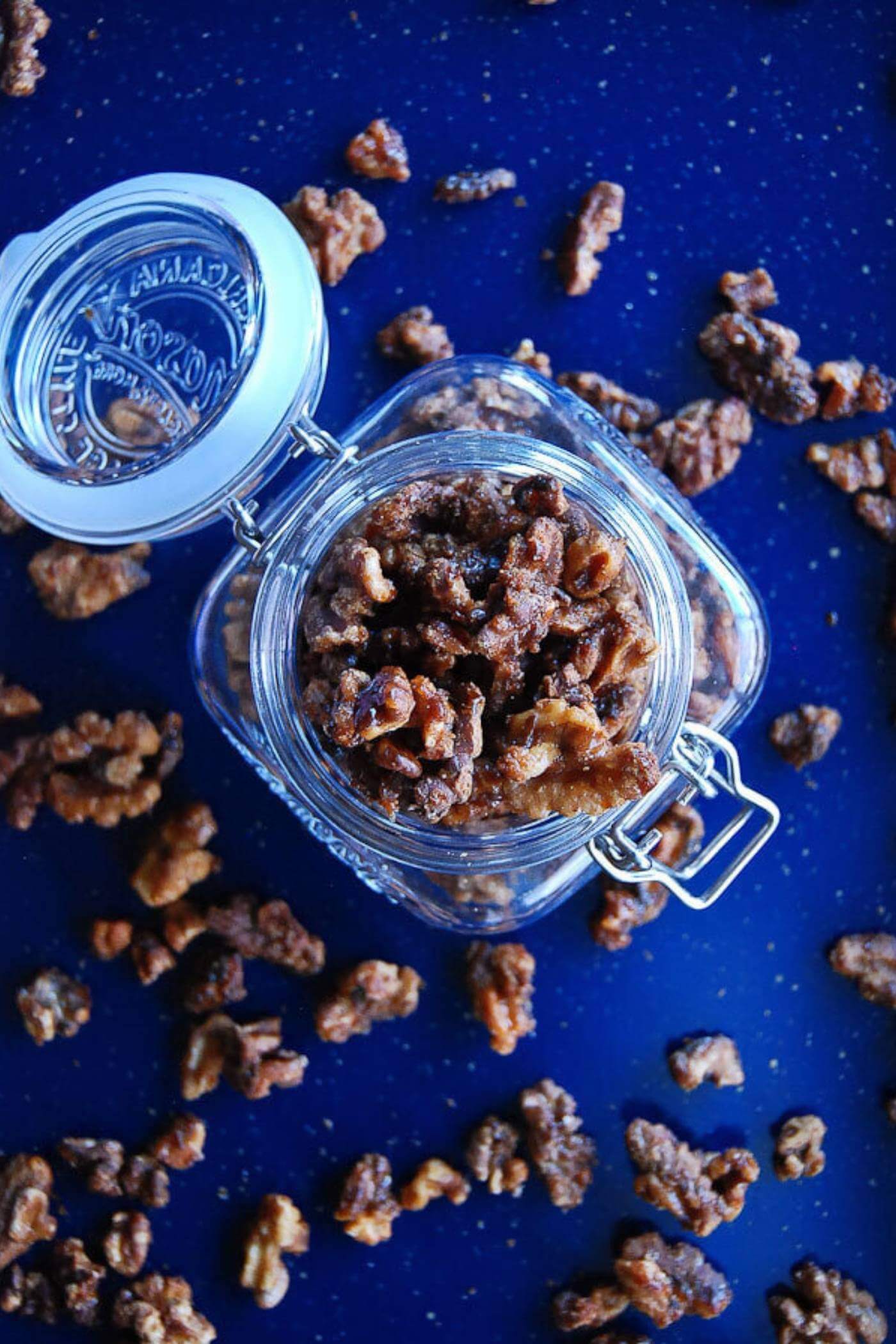 maple spiced roasted walnuts in jar.