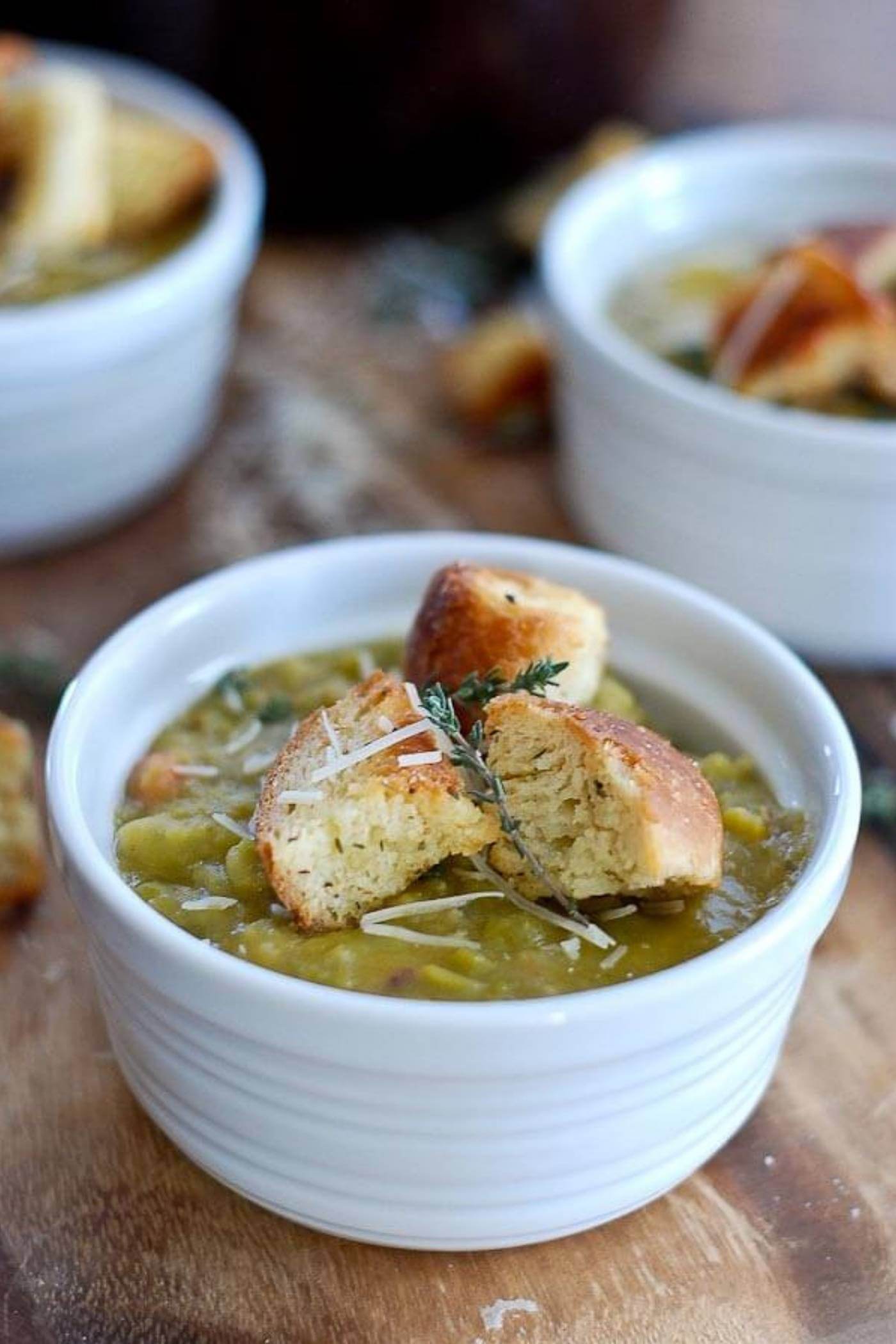 split pea soup in bowl with croutons.