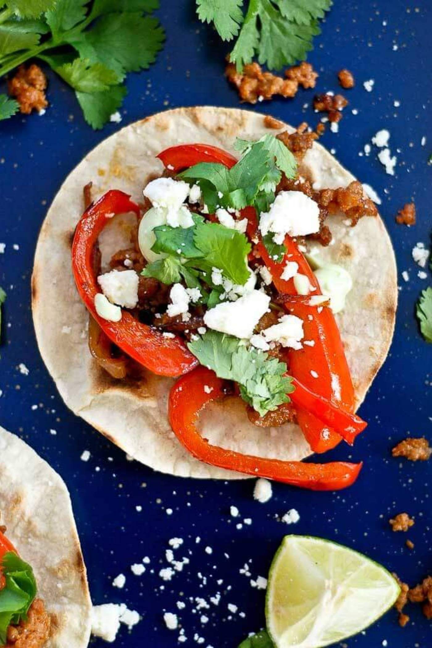 chorizo and red pepper tostadas on pan.