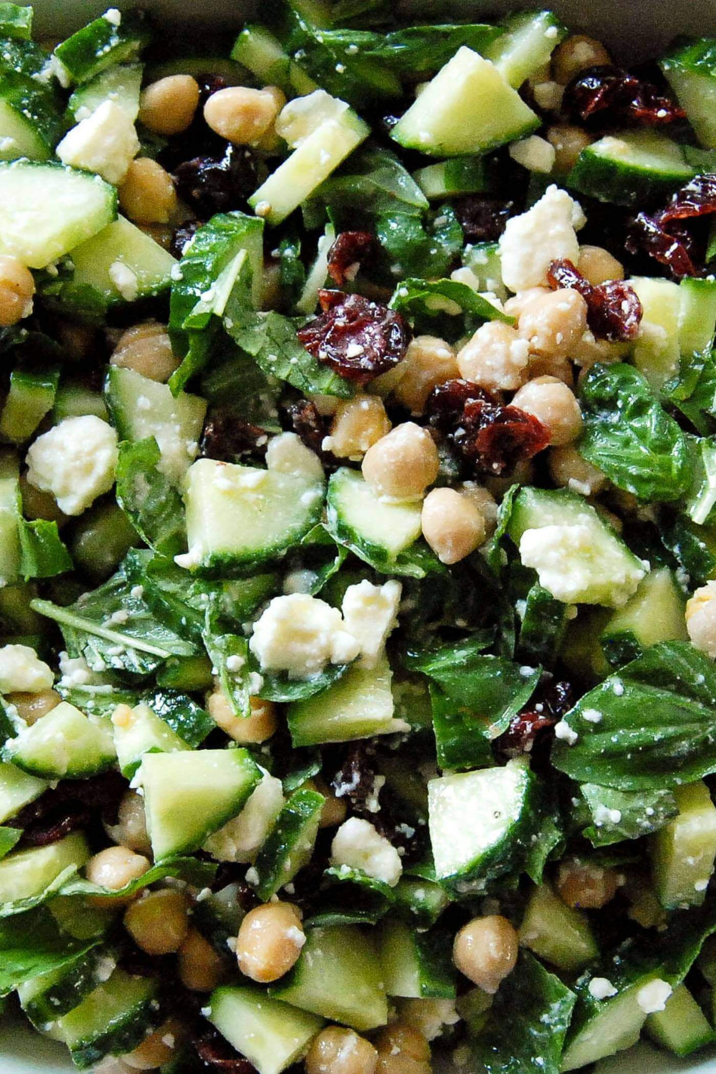 cucumber salad with chickpeas, feta, basil and cranberries.
