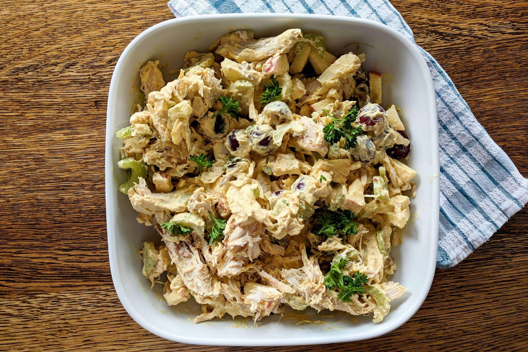 curry chicken salad with grapes in bowl