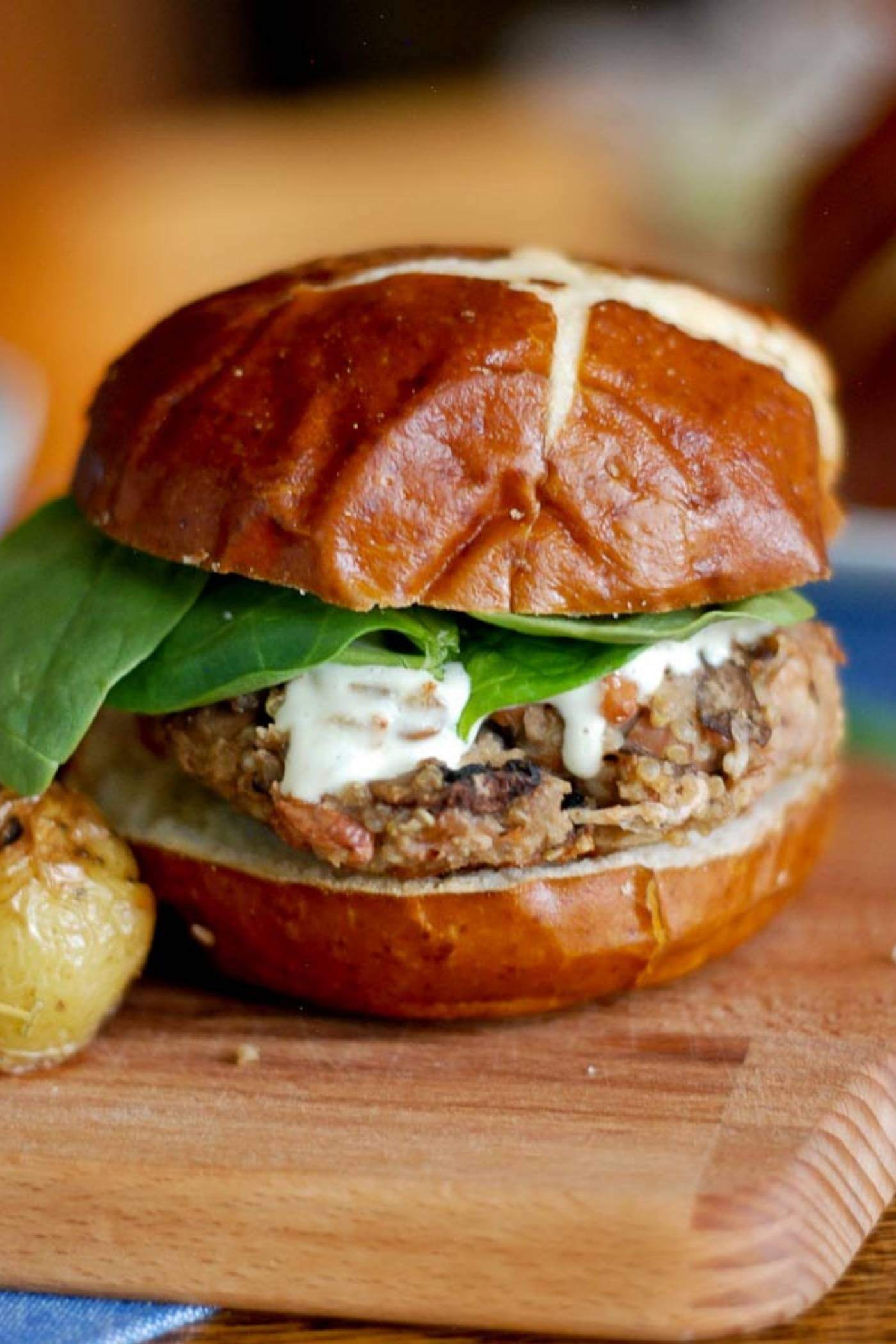 mushroom burger on cutting board.