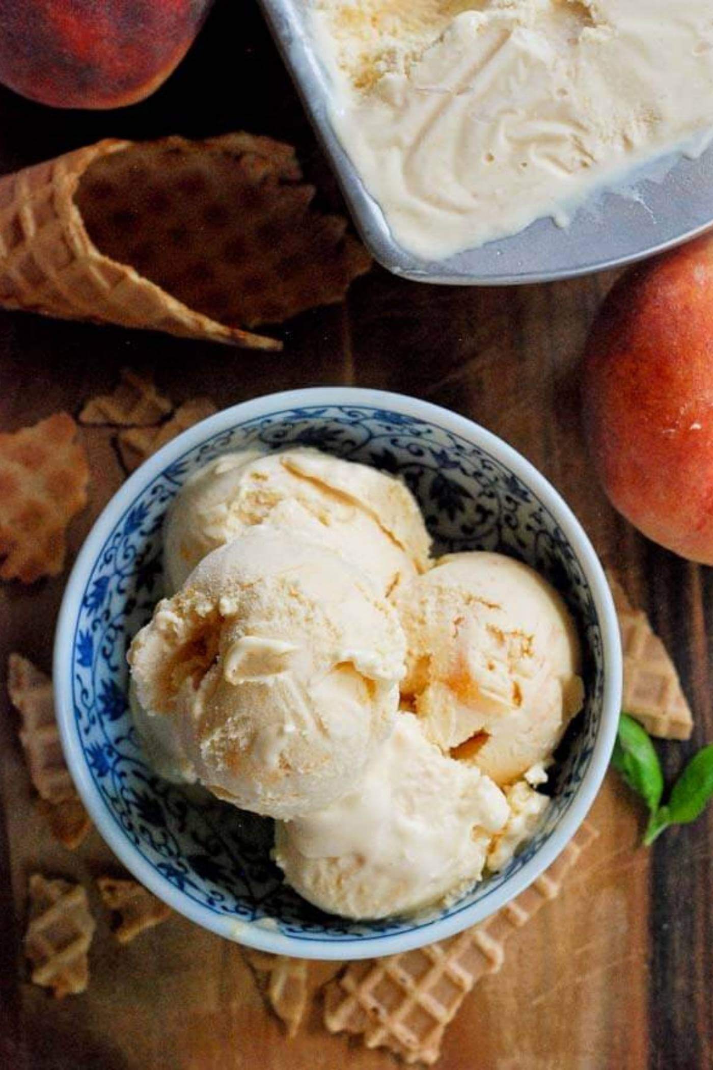 homemade peach ice cream in bowl.