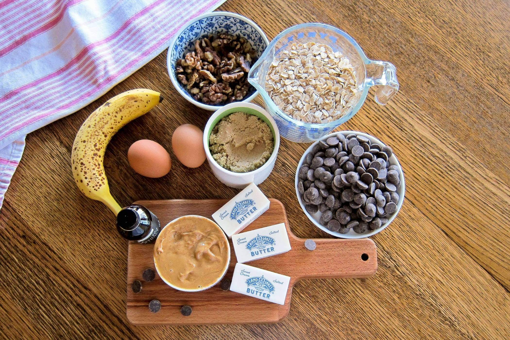 peanut butter chocolate banana bars ingredients on table.