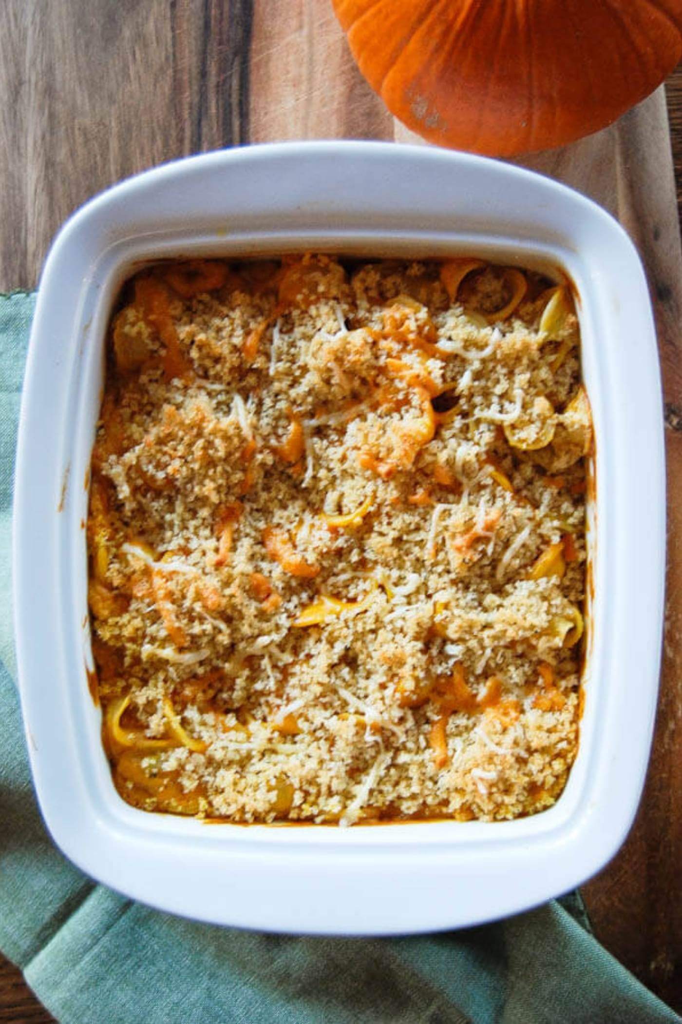 pumpkin mac and cheese in baking dish.