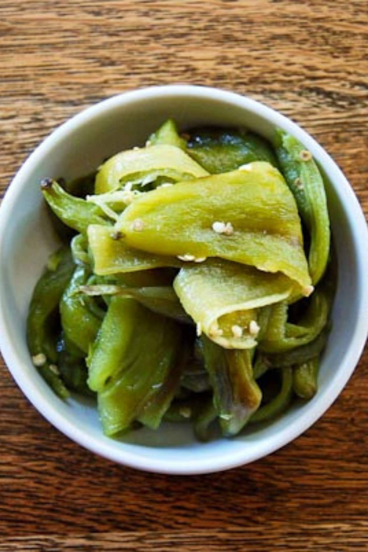 roasted hatch chiles peeled in bowl.