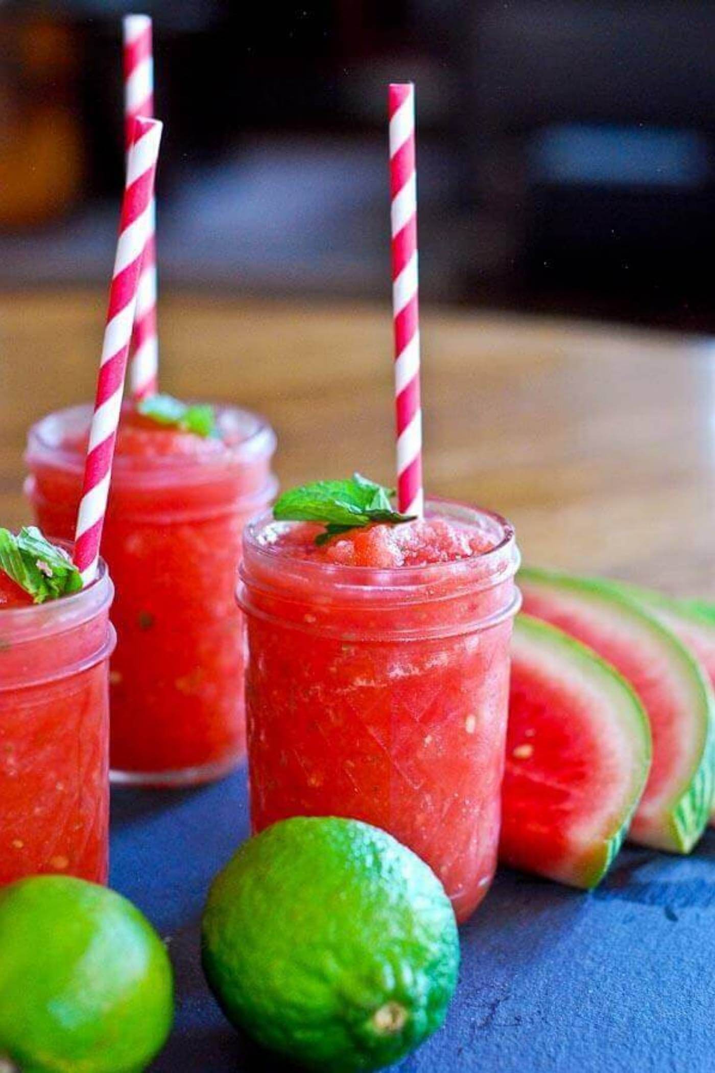 watermelon cucumber mint slushie in cup with straw.