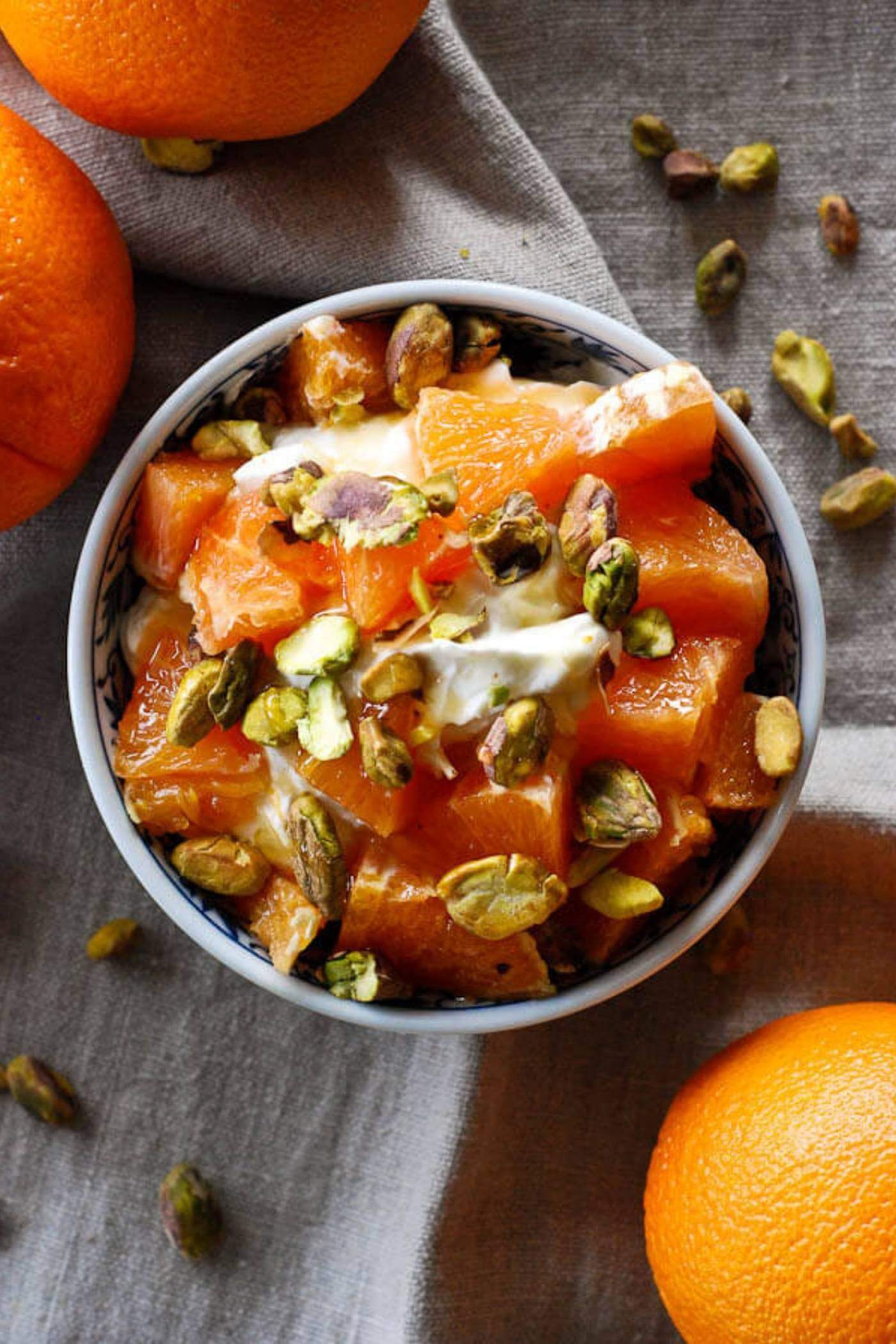 whipped creme fraiche and citrus parfait in bowl.