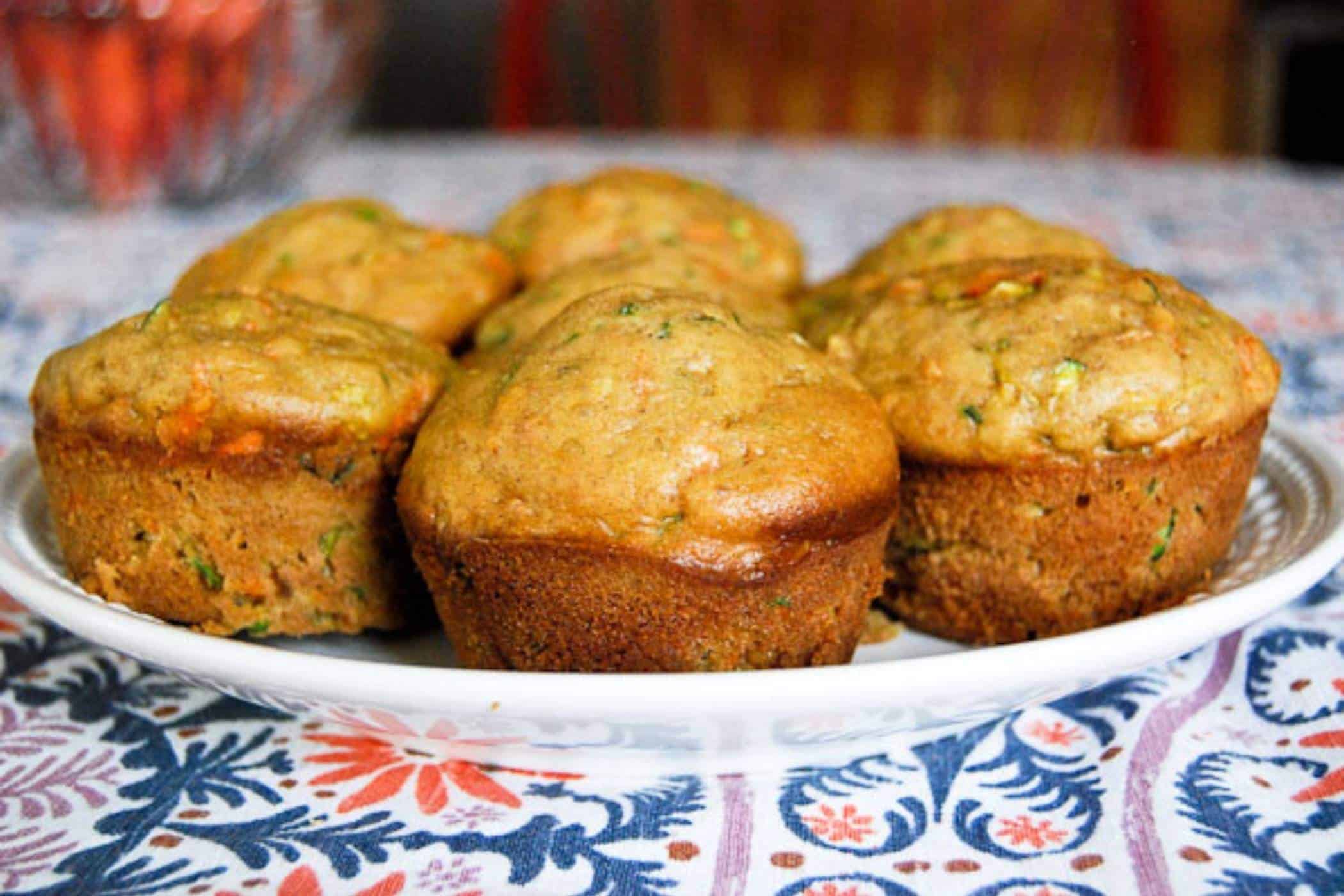 zucchini muffins on plate.