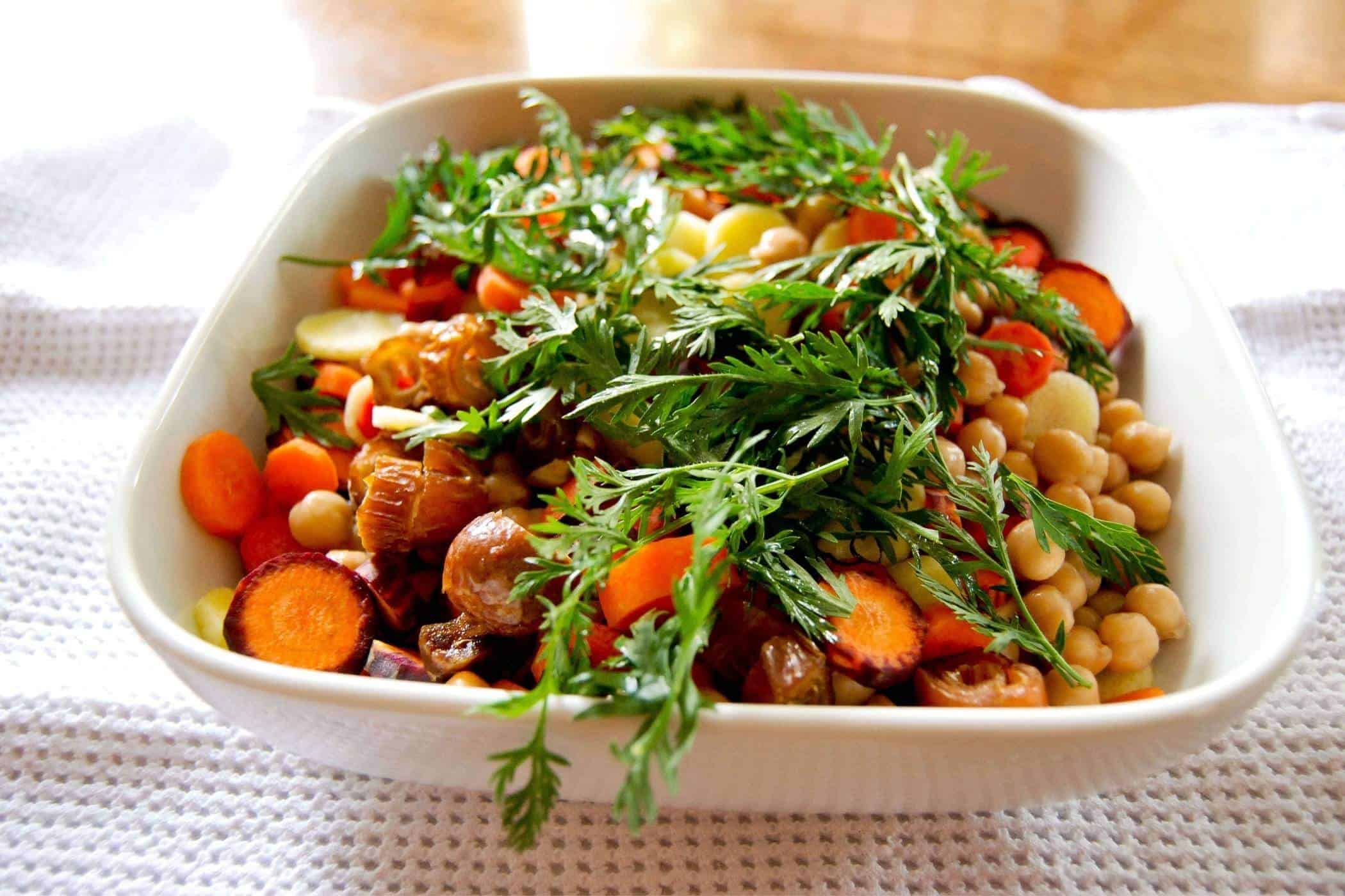 carrot date and chickpea salad in bowl.