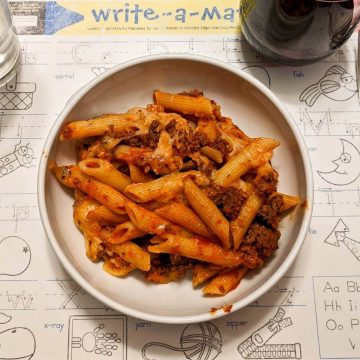 cheesy baked mostaccioli in bowl