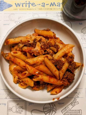 cheesy baked mostaccioli in bowl