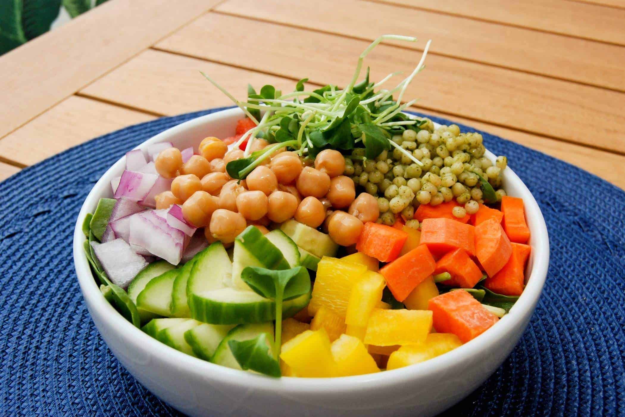 chickpea and veggie salad with couscous in bowl.