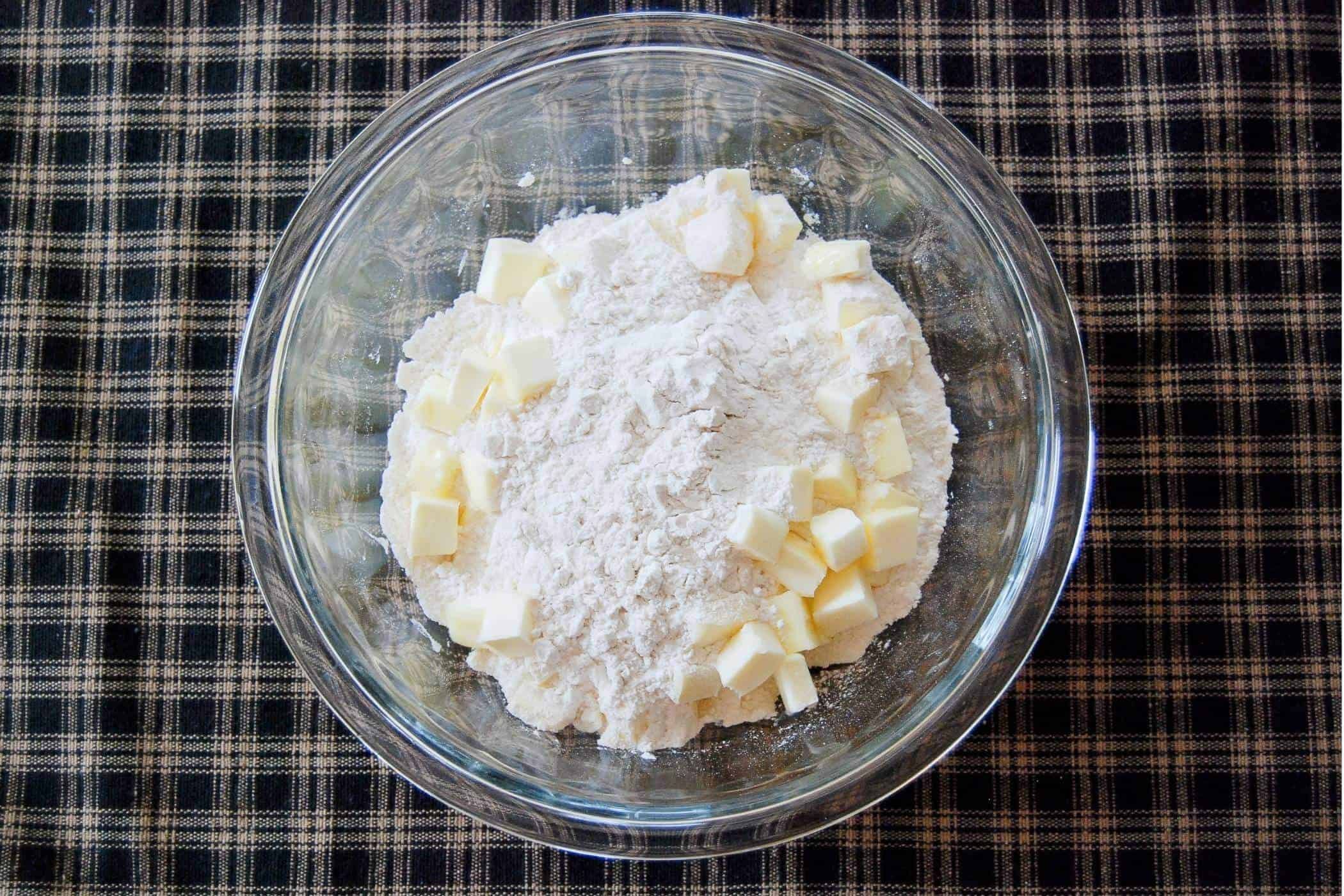 cubed butter and flour for pie crust in bowl.