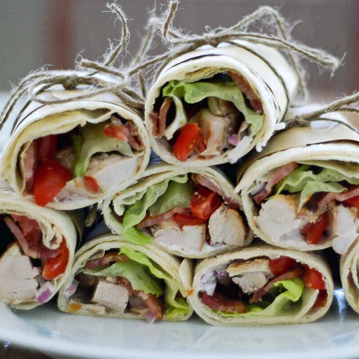 chicken bacon ranch wraps stacked on plate