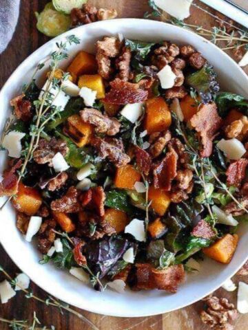 kale salad with brussel sprouts, roasted butternut squash, and maple walnuts