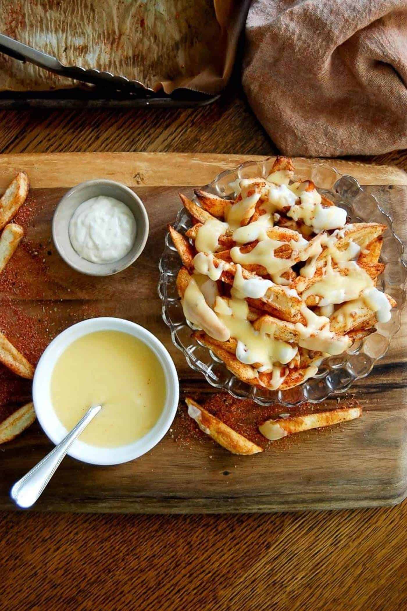 Louisiana voodoo fries with ranch and cheese sauce on the side.