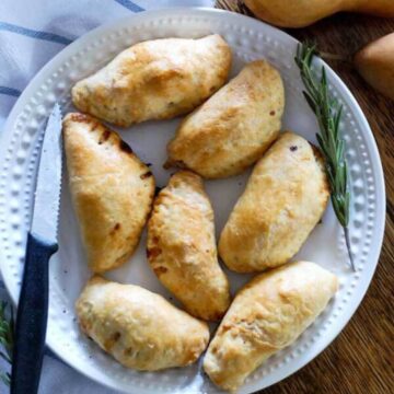 pear and cheddar hand pies on plate