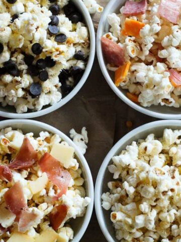 popcorn with various toppings in bowls