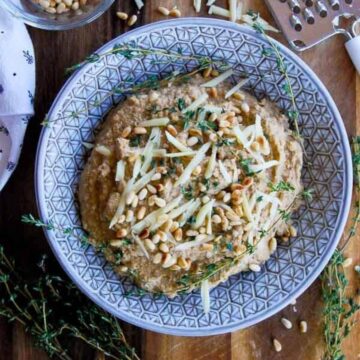 roasted garlic and cauliflower mash in bowl close up