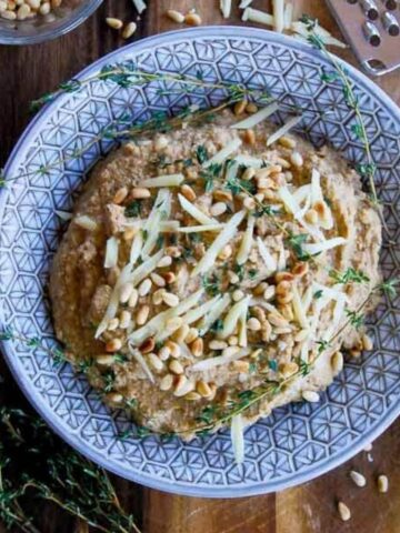 roasted garlic and cauliflower mash in bowl close up