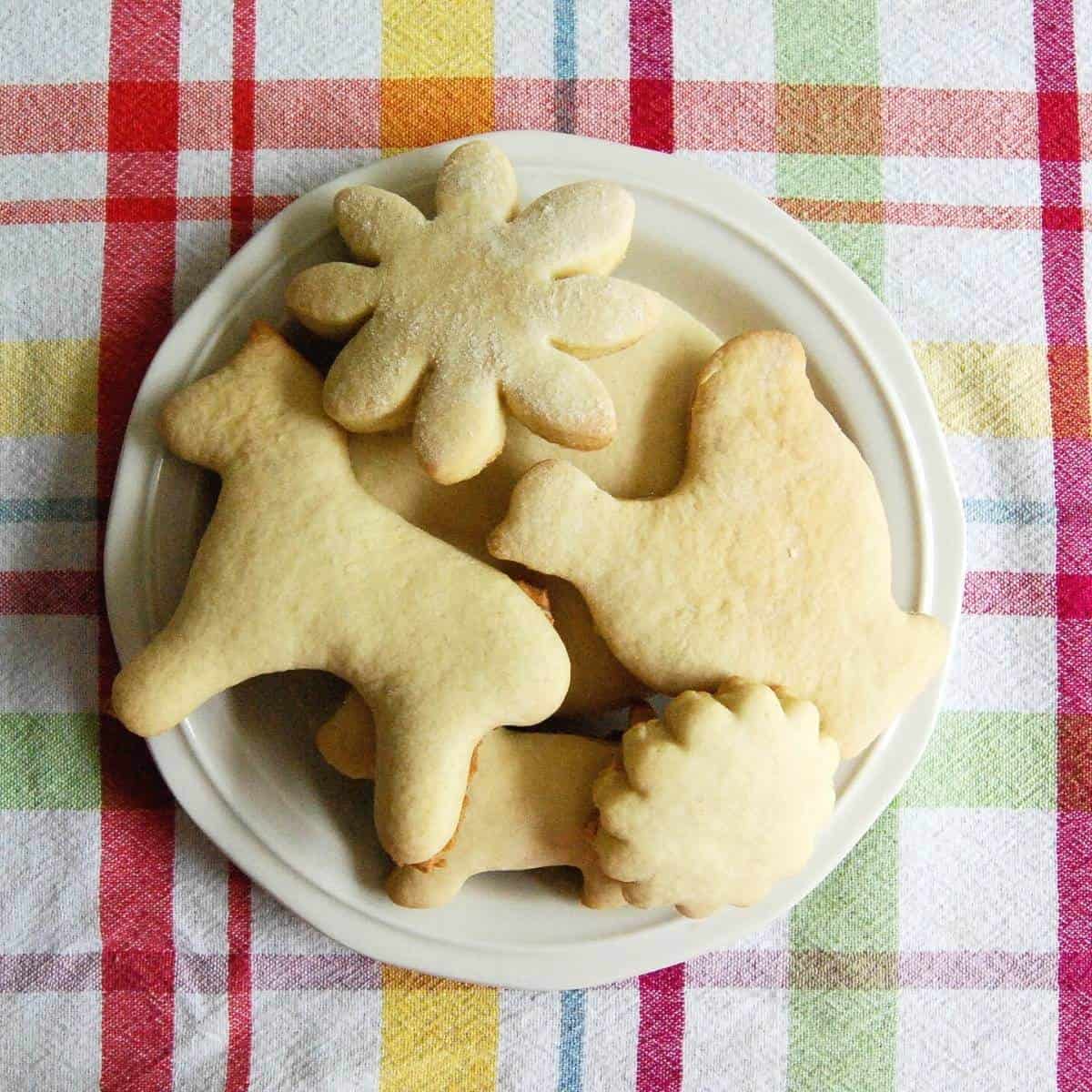 soft sugar cutout cookies on plate.