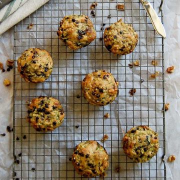 zucchini chocolate chip muffins on cooling rack