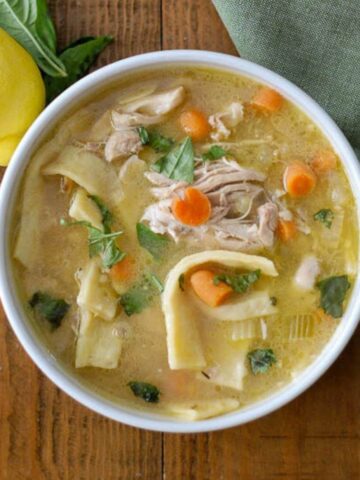 instant pot chicken noodle soup in bowl on table.