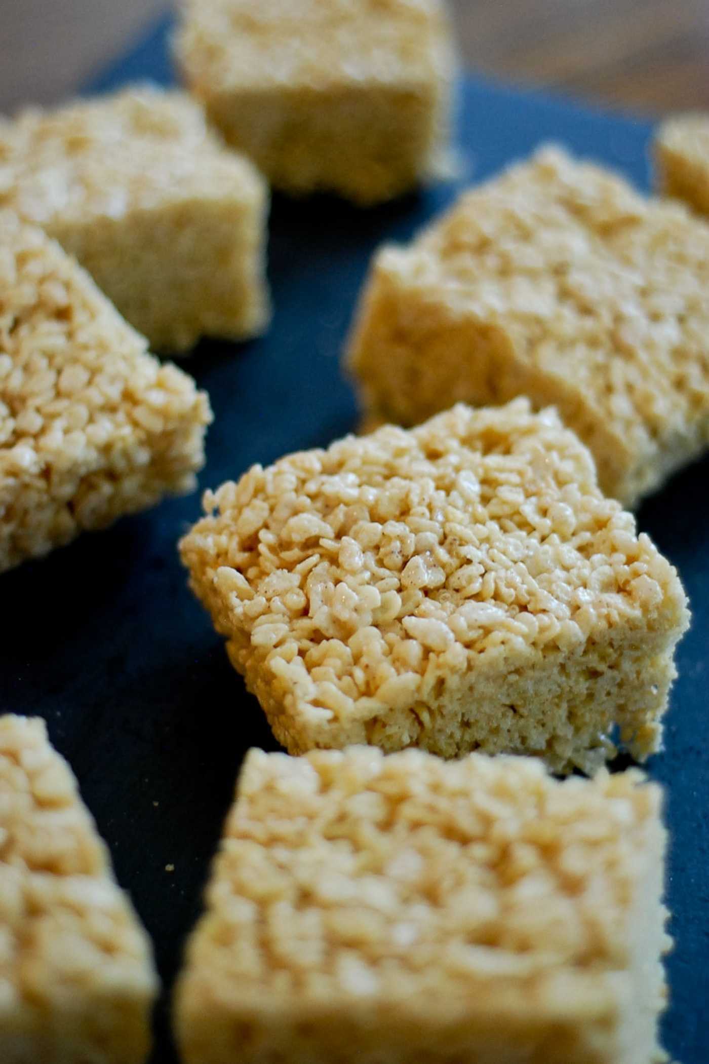 brown butter rice krispie treats on black serving board