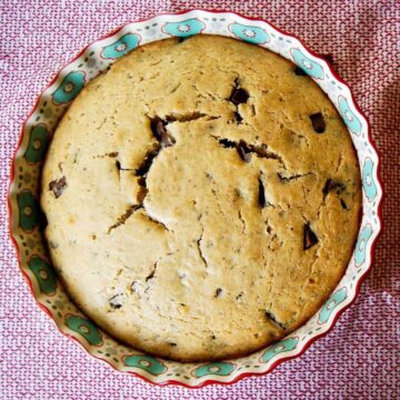 olive oil cake with rosemary and dark chocolate in pan