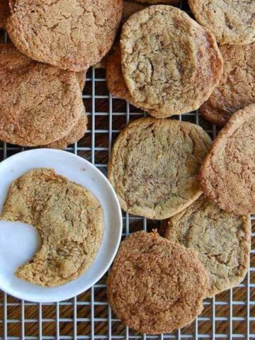 big soft ginger cookies on cooling rack.