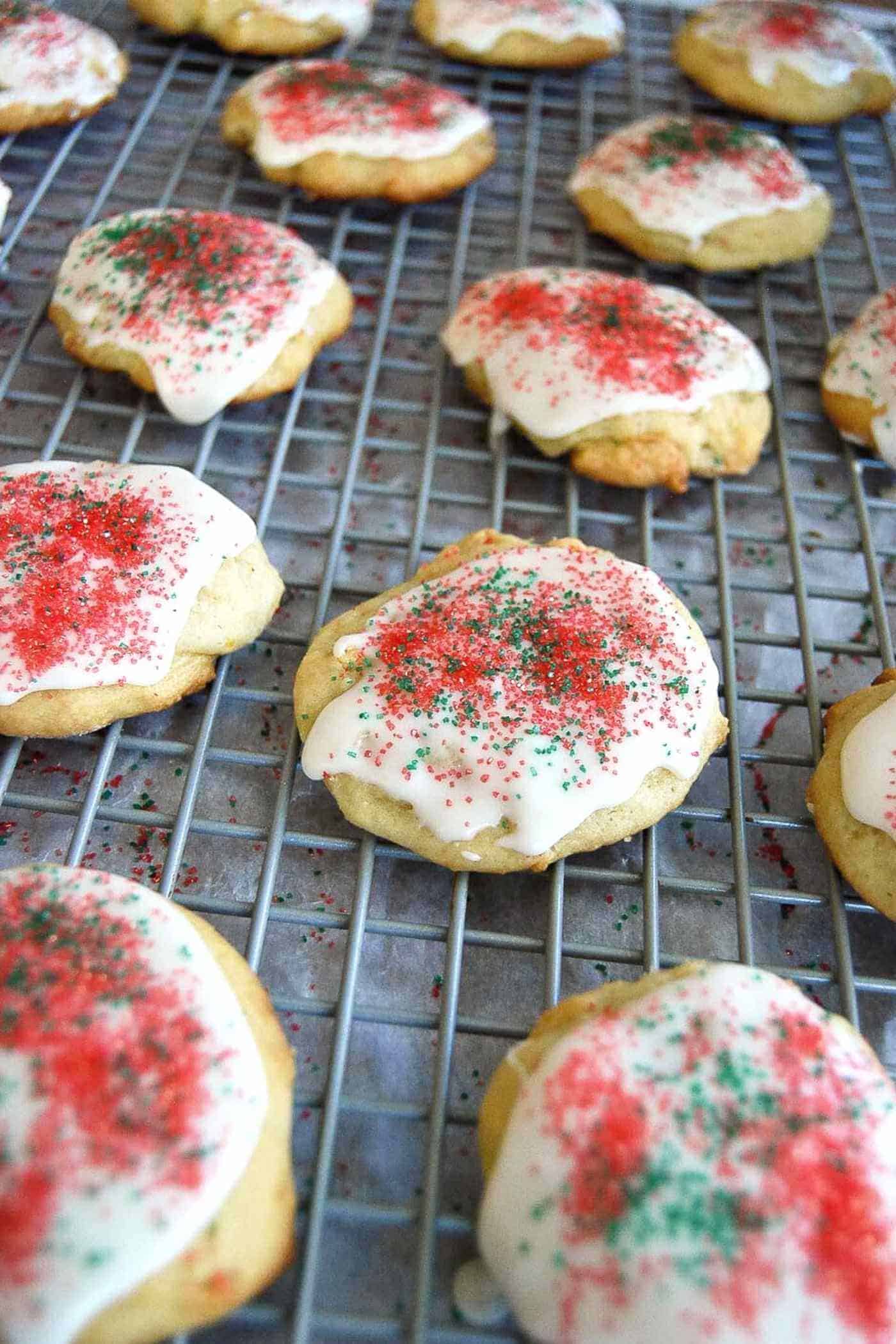 ricotta cheese cookies with icing and sprinkles.