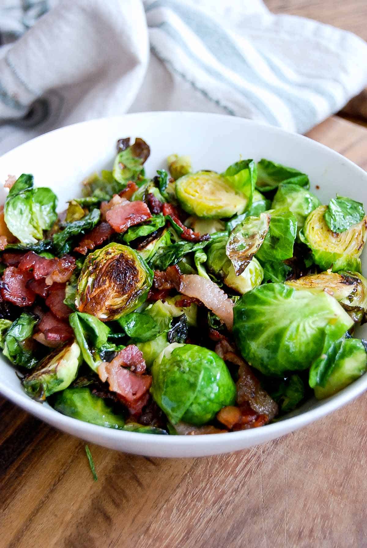 maple bacon brussel sprouts in bowl.