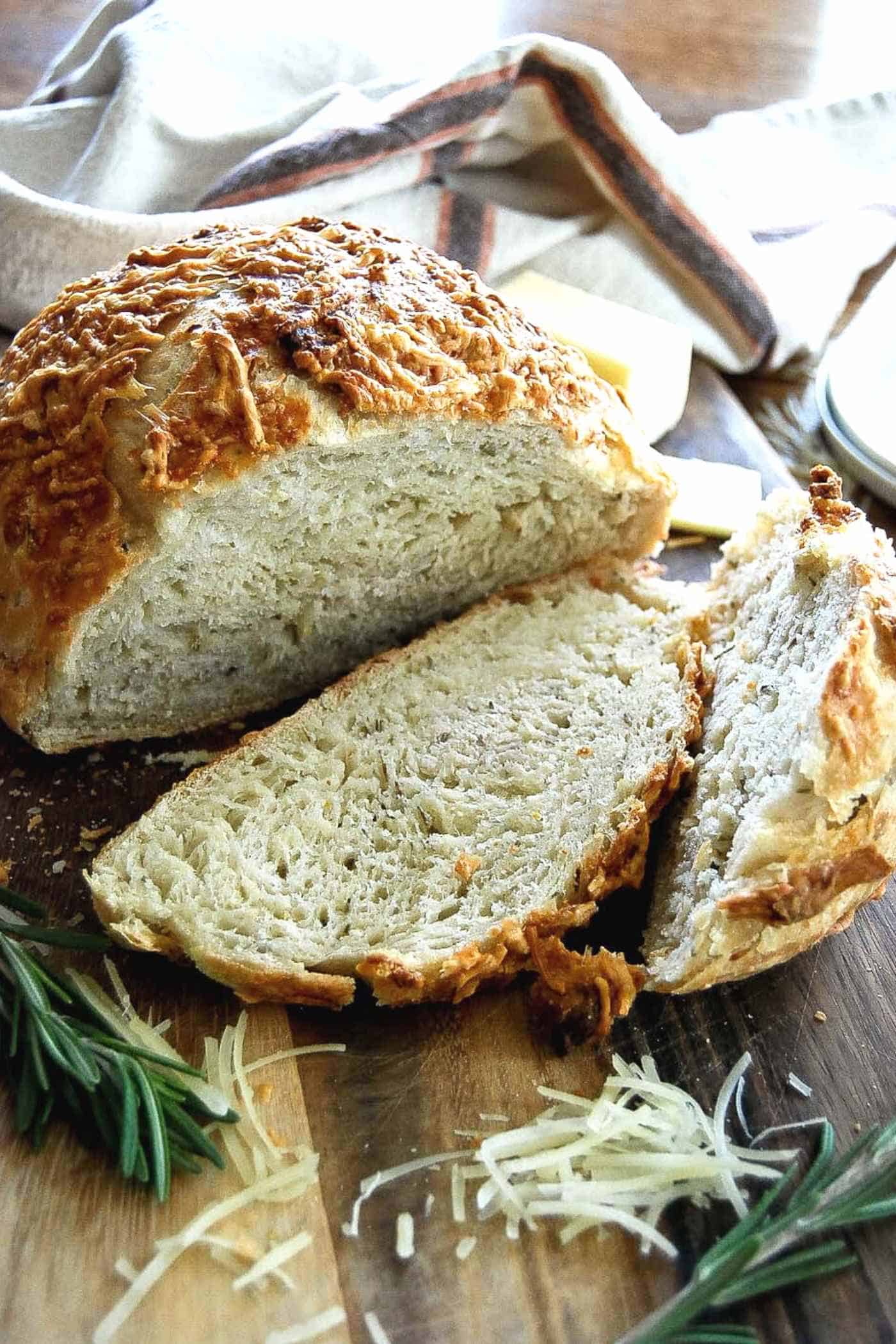 freshly cut bread on a cutting board.