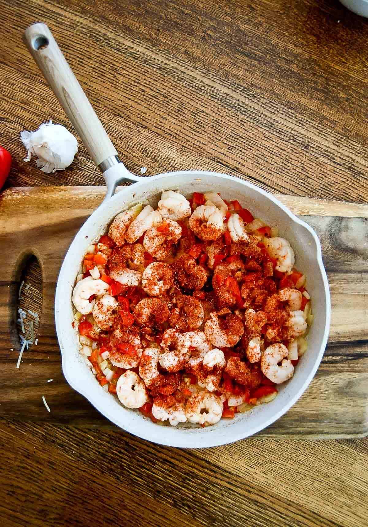 red pepper, onion, and shrimp with cajun seasoning.