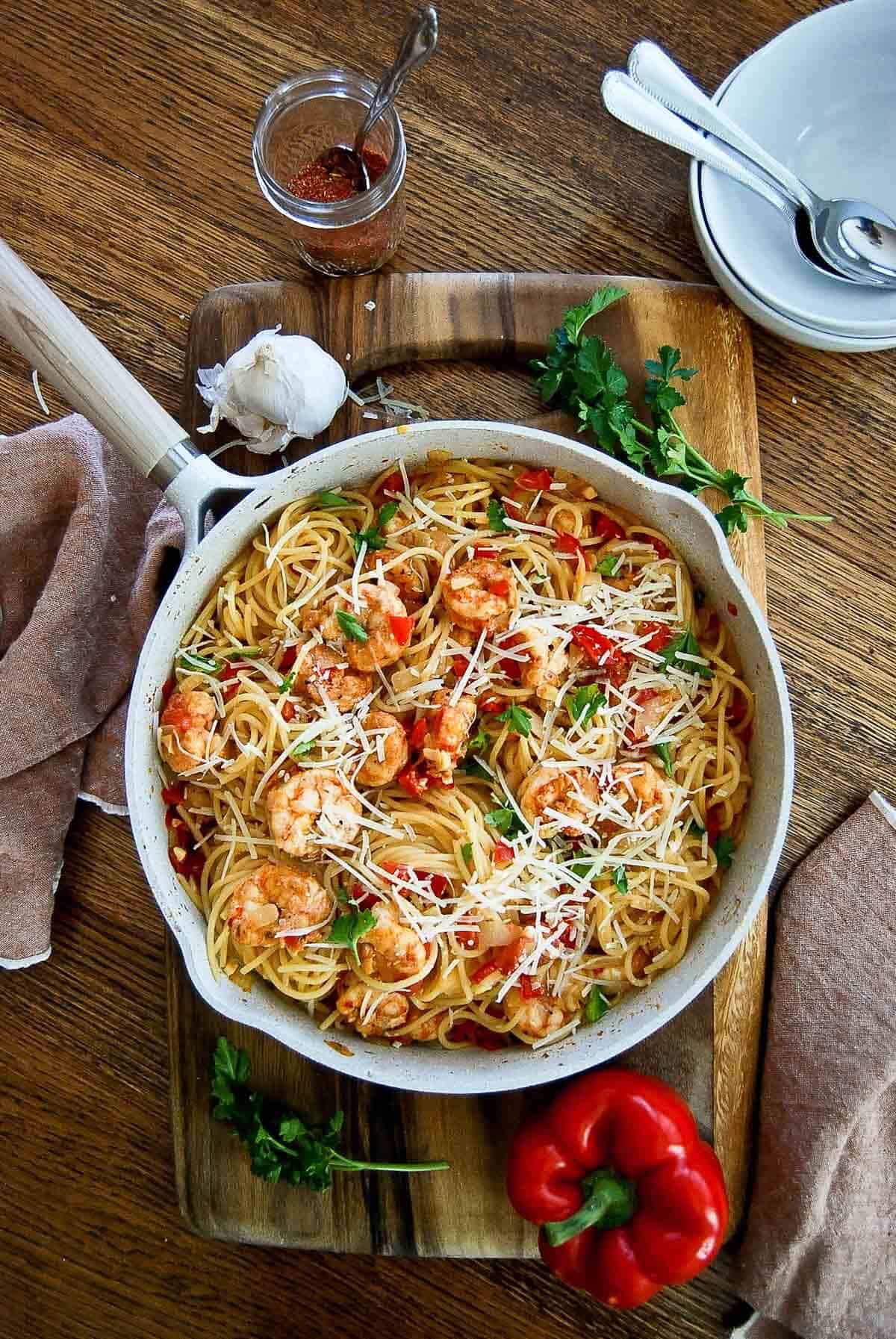 pan of cajun shrimp pasta on serving bowl.
