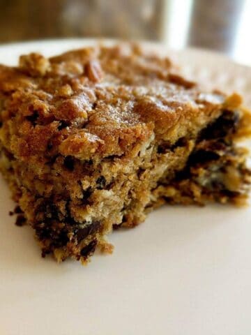 peanut butter chocolate chip oatmeal bar on plate.